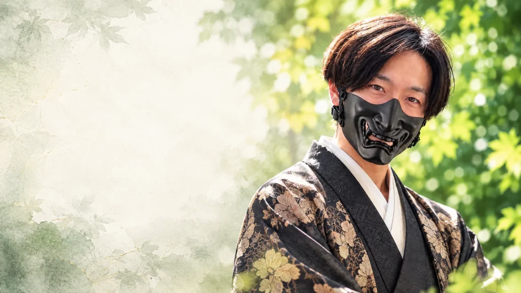 黒い和装と口元の仮面を着けた玄燈のプロフィールビジュアル